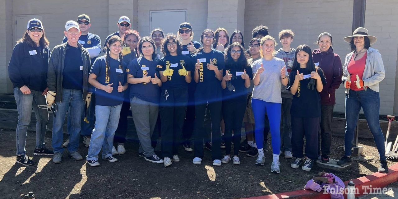 Rotarians, FHS students rescue community garden