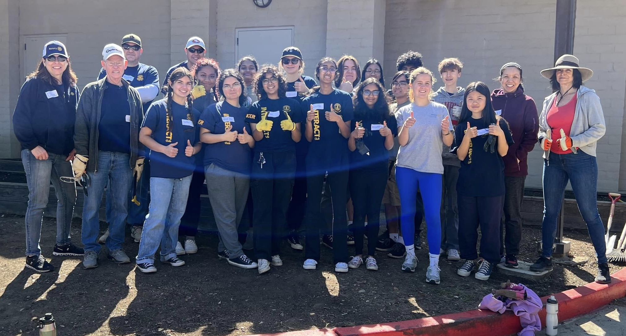 Rotarians, FHS students rescue community garden