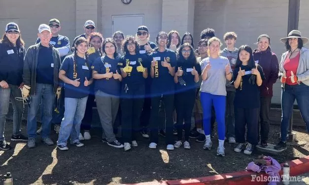 Rotarians, FHS students rescue community garden