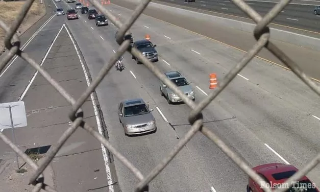 Westbound 50 shut down while officers safely remove armed person from over-crossing