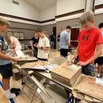 Folsom church becomes food drive bag factory, preps for Community Service Day