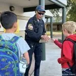 Folsom police join students for Bike and Walk to School Day