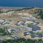 Two correctional officers hospitalized after attack